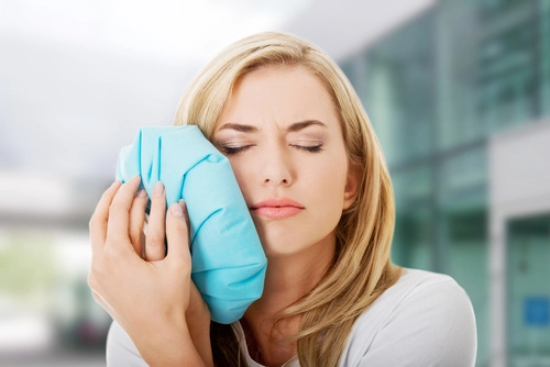 How Do I Stop My Dental Implant From Throbbing?